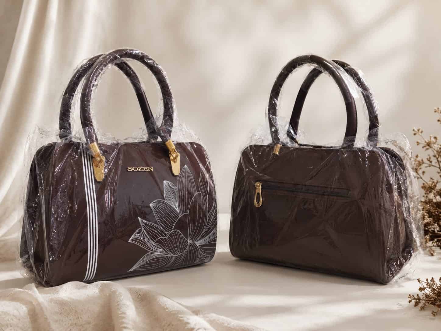 Lotus Embossed Patent Handbag